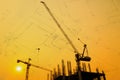 Building crane and construction site under blue sky with drawing Royalty Free Stock Photo