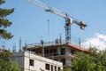Building crane and construction under blue sky Royalty Free Stock Photo