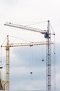 Building crane under construction against blue sky Royalty Free Stock Photo
