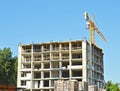 Building crane under construction site Royalty Free Stock Photo