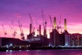 Battersea and cranes at dusk Royalty Free Stock Photo