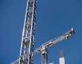 Building cranes in operation Royalty Free Stock Photo