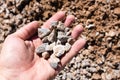 Building crushed stone with sand in hand Royalty Free Stock Photo