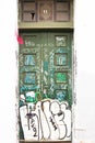 A building door with graffitis