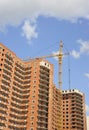 Building with elevating crane Royalty Free Stock Photo