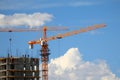 Building with elevating cranes Royalty Free Stock Photo