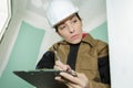 Building estimator doing survey Royalty Free Stock Photo