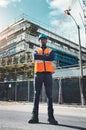 Building excellence is in my blood. Portrait of a confident young man working at a construction site. Royalty Free Stock Photo