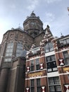 Building exterior in old Amsterdam. Church on a canal