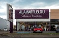 Building facade of Alain afflelou glass and eyecare store in Le Mans, France