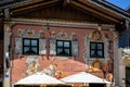 Building facade of Ammergauer Krippenstube nativity scene shop with Lueftlmalerei mural paintings Bavarian three dimensional