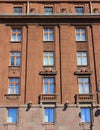 Building facade architecture of old residential house outside.