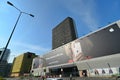 Building facade completely covered by huge advertising billboard for Apple iphone