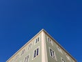 Building facade corner against blue sky