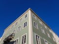 Building facade corner against blue sky