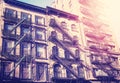 Building facade with fire escape, New York City. Royalty Free Stock Photo