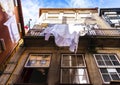 Building facade and hanging laundry in Porto, Portugal Royalty Free Stock Photo