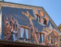 Building facade with Lueftlmalerei mural paintings Bavarian three dimensional painted frescoes that depict of Jesus Christ on