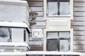 Building facade of modern high-rise apartment house covered with snow and frost after heavy windy snowstorm Snowfall and blizzard Royalty Free Stock Photo