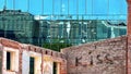 Building facade  Sun  Reflection graffiti love peace kiss red heart on wall ,modern  and old vintage house blue Windows  glass a Royalty Free Stock Photo