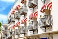 A building with figured balconies. Royalty Free Stock Photo