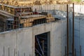 Building foundation construction. Monolithic concrete and reinforced concrete structures on the construction site. The use of