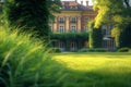 A building framed by lush green grass in a peaceful setting