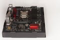 Building of gaming PC, motherboard with installing CPU.