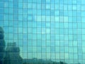 Building glass, glass building on cloudy blue sky background, Royalty Free Stock Photo