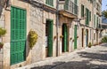 Building with green doors and shutters Royalty Free Stock Photo