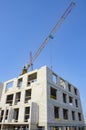 Construction site, cranes, building a house Royalty Free Stock Photo