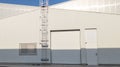 Building industrial facade exterior of modern white building warehouse Royalty Free Stock Photo