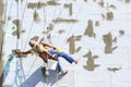 Building industrial worker hanging