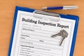 Building Inspection Report with Pen and Keys Royalty Free Stock Photo