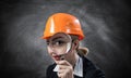 Building inspector looking through magnifier Royalty Free Stock Photo