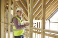 Building Inspector Looking At New Property Royalty Free Stock Photo