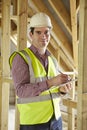 Building Inspector Looking At New Property Royalty Free Stock Photo