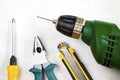 Building instrument set, tape measure, pliers, screwdriver, ruler, drill, hammer and utility knife Royalty Free Stock Photo