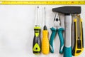 Building instrument set, tape measure, pliers, screwdriver, ruler, drill, hammer and utility knife Royalty Free Stock Photo