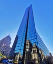 The building at the intersection of Boston, USA, the glass curtain reflects the classical church next to it