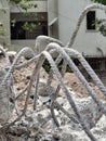 Steel rods or bars used to reinforce concrete, in warehouse.