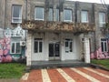 The building in Kobuleti, Georgia. A building with faces carved in stone and street art