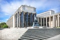 The building of the Lenin Library and the Dostoevsky monument in Moscow. Inscription: Library named after Lenin