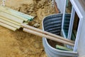 Building materials construction new residential home on window well for basement