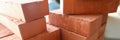 Building materials are on floor, stack red bricks Royalty Free Stock Photo