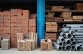 Building materials storage with bricks wood and pipes. Various construction supplies displayed. Architectural elements organized Royalty Free Stock Photo