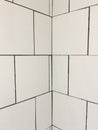 White tile ceramics of a bathroom wall