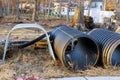 Building materials window well for basement drainage pipe on a construction stacked sewage