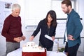 Is this building model to scale. a group of architects discussing building plans in the office. Royalty Free Stock Photo