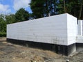 Building a modern energy efficient house the foundation and the walls from waterproofing ICF blocks concrete walls with two